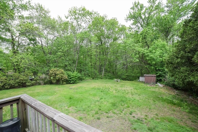 213 Nashua Rd, Billerica, MA 01862 - view of grassy yard featuring a storage shed