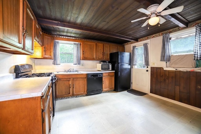 213 Nashua Rd, Billerica, MA 01862 - kitchen with black appliances, light flooring, light countertops, a wood ceiling with exposed beams, and brown cabinets