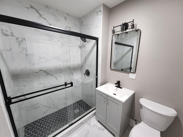 97-99 Blaisdell St Unit 1, Haverhill, MA 01832 - full bathroom with marble look tile flooring, vanity, a marble finish shower, and toilet