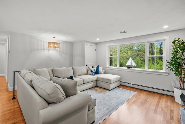 3 Laurie, Harwich, MA 02646 - living area with a baseboard heating unit, a chandelier, light wood finished floors, and recessed lighting