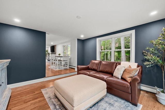 3 Laurie, Harwich, MA 02646 - living area featuring a baseboard heating unit, wood finished floors, baseboards, and recessed lighting