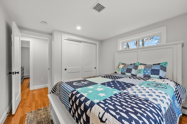3 Laurie, Harwich, MA 02646 - bedroom featuring wood finished floors, a closet, baseboards, and recessed lighting