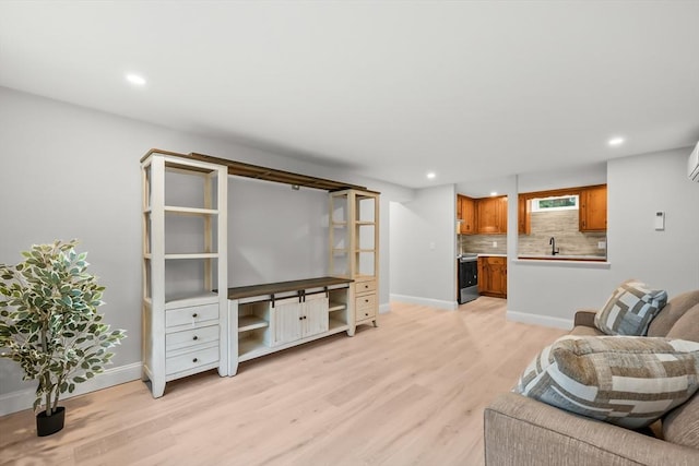 3 Laurie, Harwich, MA 02646 - living room featuring light wood-style flooring, recessed lighting, baseboards, and bar area