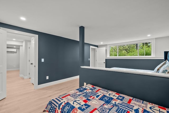 3 Laurie, Harwich, MA 02646 - bedroom with light wood-style flooring, recessed lighting, baseboards, and a wall unit AC