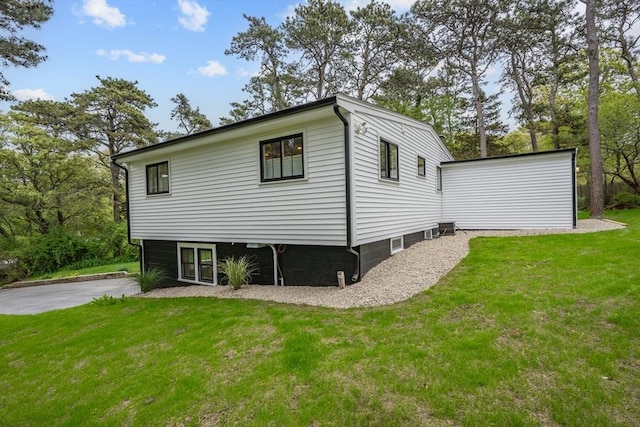 3 Laurie, Harwich, MA 02646 - view of side of home with a yard