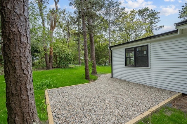 3 Laurie, Harwich, MA 02646 - view of grassy yard with a patio