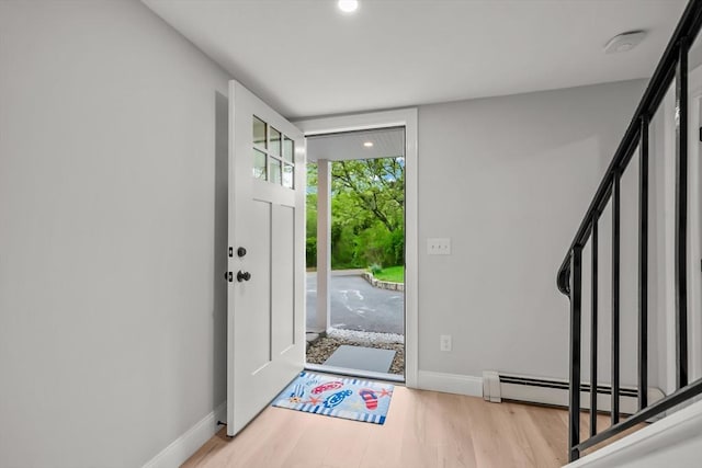 3 Laurie, Harwich, MA 02646 - entrance foyer with baseboard heating, wood finished floors, baseboards, and recessed lighting