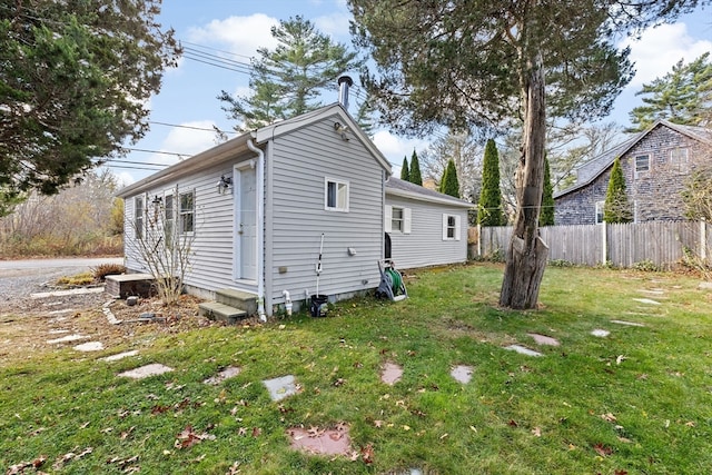 view of home's exterior featuring a lawn