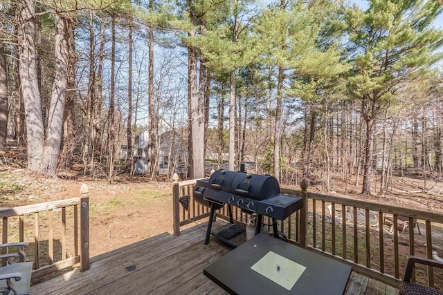 wooden deck with area for grilling