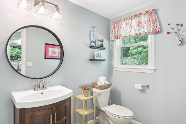 23 Jasmine Ct, Dracut, MA 01826 - half bath with toilet, vanity, and baseboards