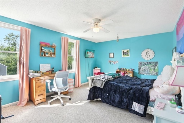 23 Jasmine Ct, Dracut, MA 01826 - bedroom featuring light colored carpet, a textured ceiling, ceiling fan, and baseboards