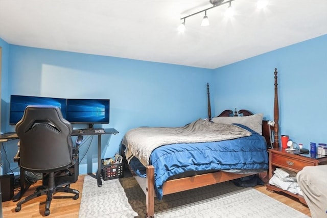 23 Jasmine Ct, Dracut, MA 01826 - bedroom with wood finished floors, track lighting, and a desk