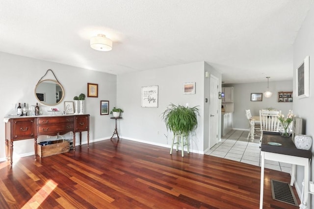 23 Jasmine Ct, Dracut, MA 01826 - interior space with wood finished floors and baseboards