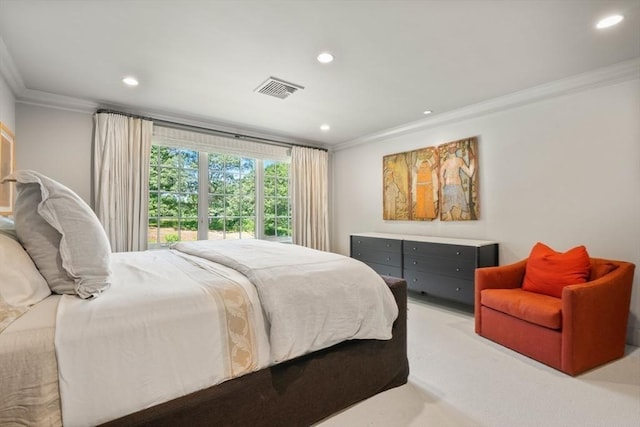 bedroom featuring light carpet and ornamental molding