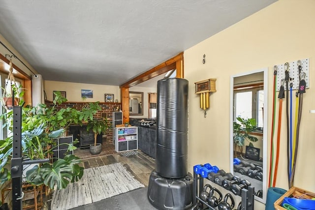 interior space with dark hardwood / wood-style flooring and a fireplace