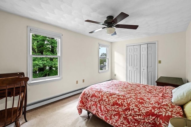 5 Emery Ct, Stoneham, MA 02180 - bedroom with multiple windows, carpet flooring, a baseboard heating unit, and ceiling fan