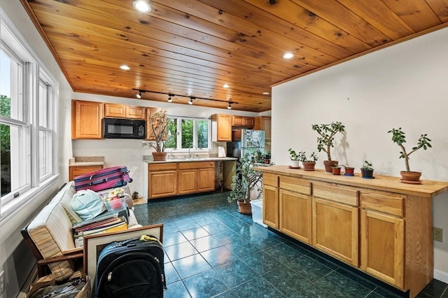 5 Emery Ct, Stoneham, MA 02180 - kitchen featuring black microwave, wooden ceiling, a sink, freestanding refrigerator, and recessed lighting