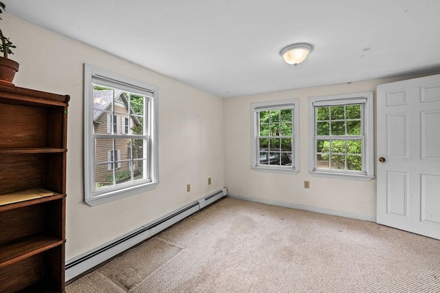 5 Emery Ct, Stoneham, MA 02180 - unfurnished room featuring a baseboard heating unit, light colored carpet, and baseboards