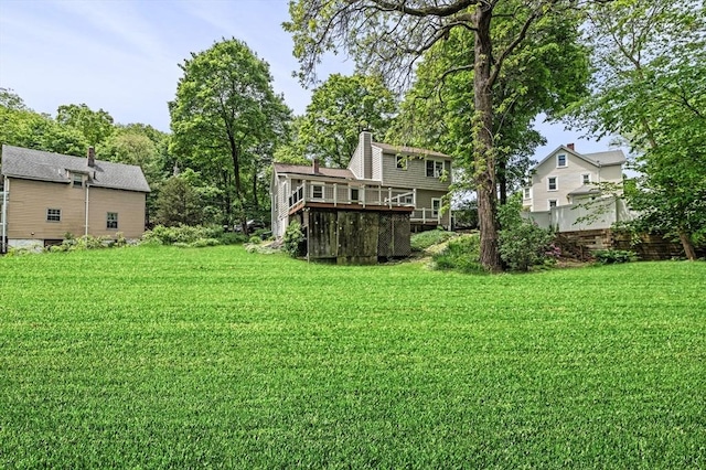 5 Emery Ct, Stoneham, MA 02180 - view of green lawn with a wooden deck