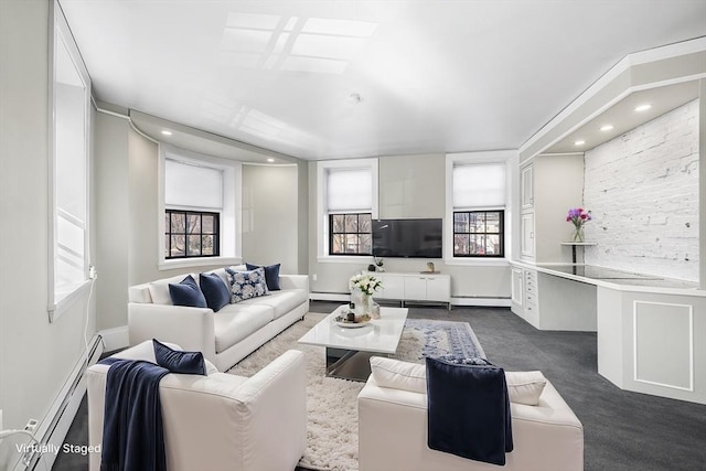 living room with baseboards, recessed lighting, dark colored carpet, and a baseboard radiator