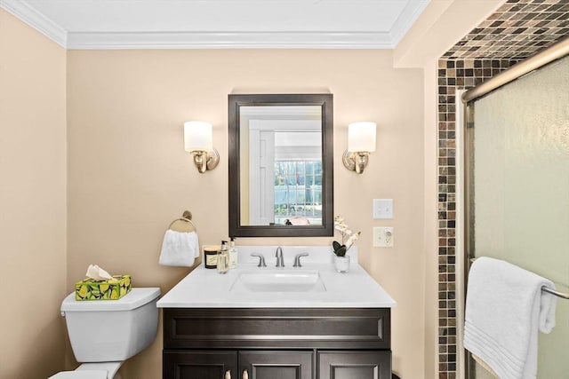full bath with a shower with door, toilet, vanity, and ornamental molding