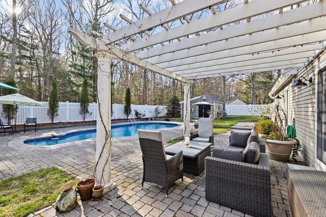 view of pool with a pergola, a fenced backyard, a fenced in pool, and an outbuilding