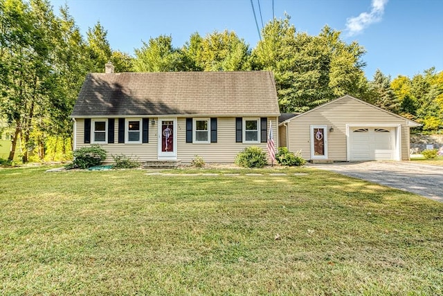 view of front of home with aphalt driveway, a front yard, a chimney, and entry steps