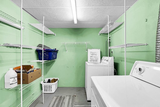 laundry area featuring washer and dryer and laundry area