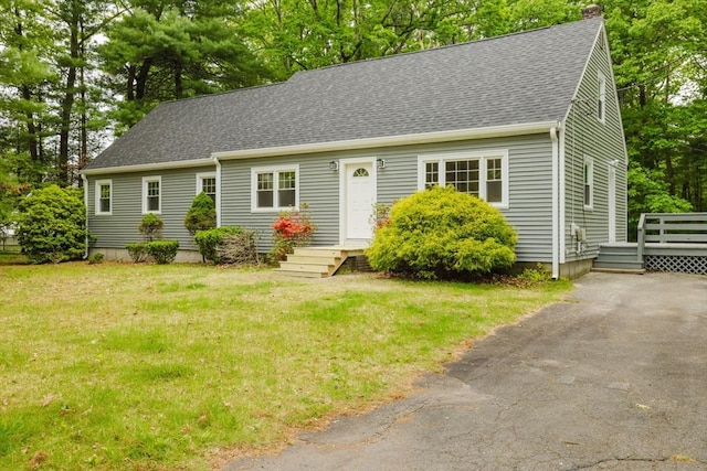 13 Webster St, Mansfield, MA 02048 - cape cod home with a shingled roof, a chimney, a front lawn, and a deck
