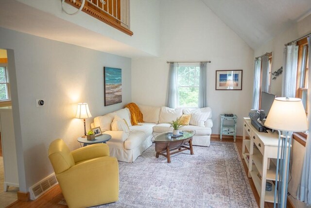10 Kellies Path, Eastham, MA 02642 - living room with baseboards and high vaulted ceiling
