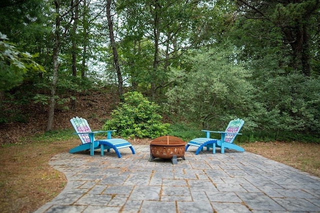 10 Kellies Path, Eastham, MA 02642 - view of patio featuring an outdoor fire pit