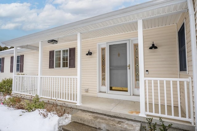 entrance to property with a porch