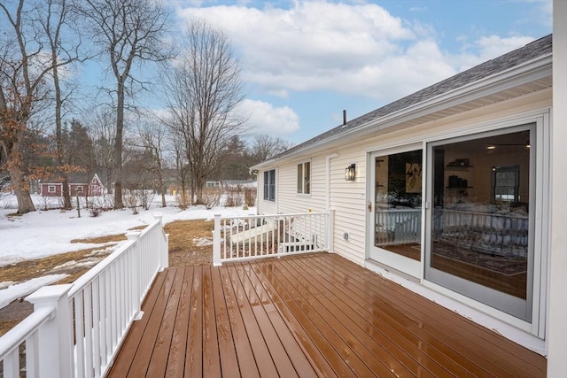 view of snow covered deck