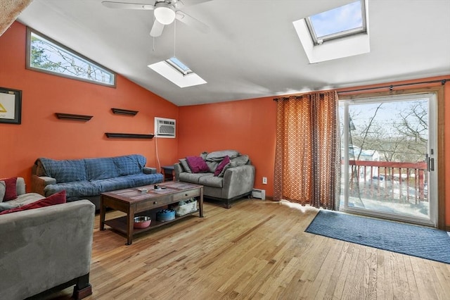 living room featuring lofted ceiling, a baseboard heating unit, ceiling fan, and light hardwood / wood-style flooring