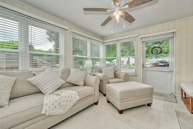 277 Ridgewood Dr, Norwood, MA 02062 - carpeted living room with healthy amount of natural light, a ceiling fan, and ornamental molding