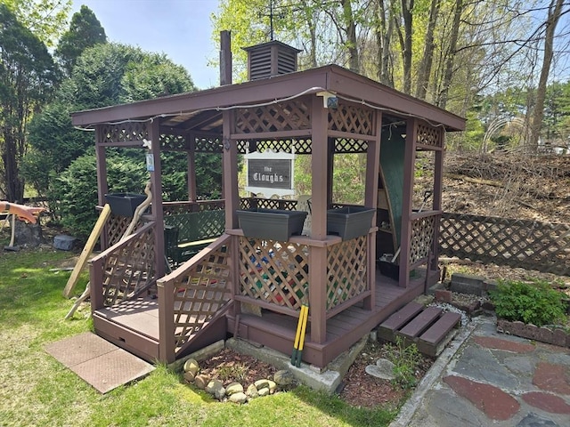 wooden deck featuring a gazebo