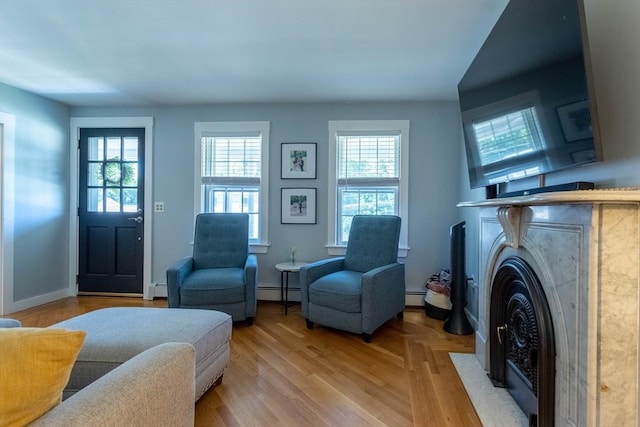 3846 Pawtucket, East Providence, RI 02915 - living room featuring plenty of natural light, baseboard heating, and a fireplace