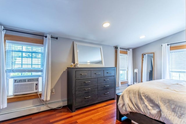 3846 Pawtucket, East Providence, RI 02915 - bedroom featuring a baseboard heating unit, light wood-style floors, recessed lighting, cooling unit, and lofted ceiling