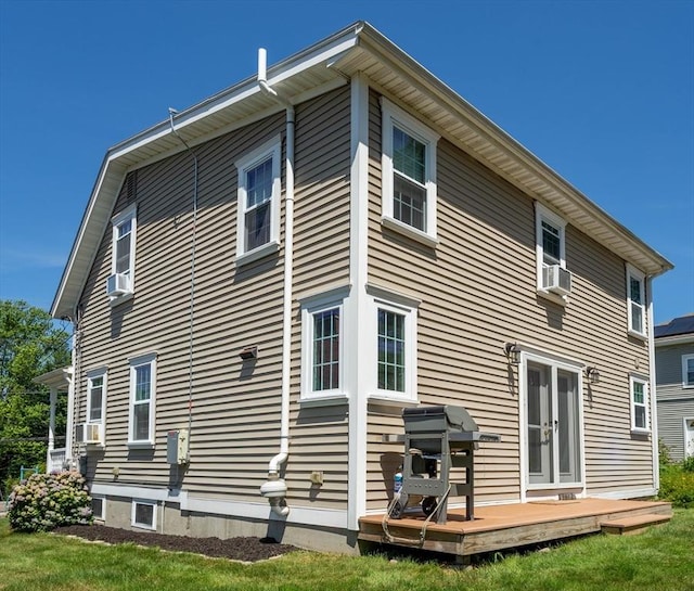 3846 Pawtucket, East Providence, RI 02915 - back of property featuring a deck, cooling unit, and a yard