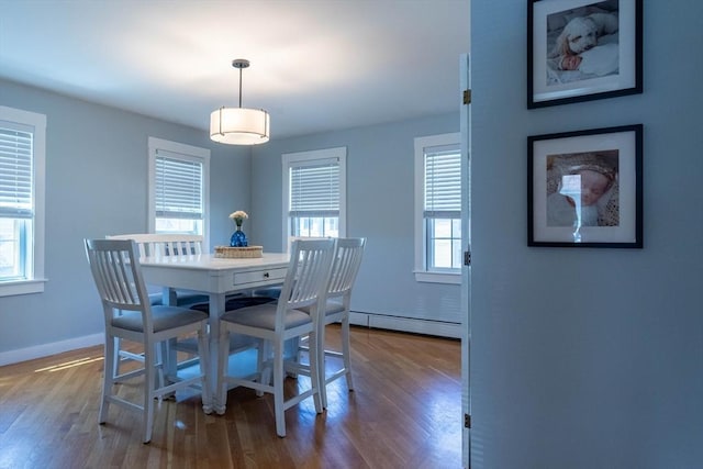 3846 Pawtucket, East Providence, RI 02915 - dining room featuring baseboard heating and wood finished floors