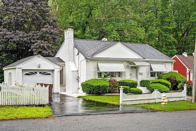 18 Tatnuck Gdns, Worcester, MA 01602 - view of front of house with driveway, a garage, roof with shingles, and a chimney