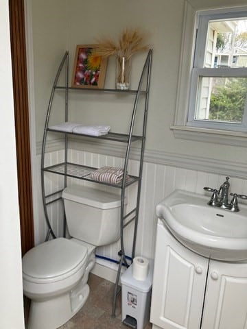 bathroom featuring vanity and toilet