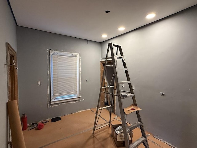 workout area featuring recessed lighting