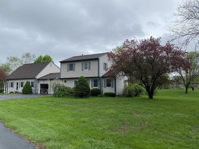 14 Plain Rd E Unit B, Deerfield, MA 01373 - view of front of property with a garage, asphalt driveway, and a front yard
