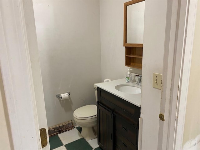 14 Plain Rd E Unit B, Deerfield, MA 01373 - half bath featuring toilet, vanity, and tile patterned floors