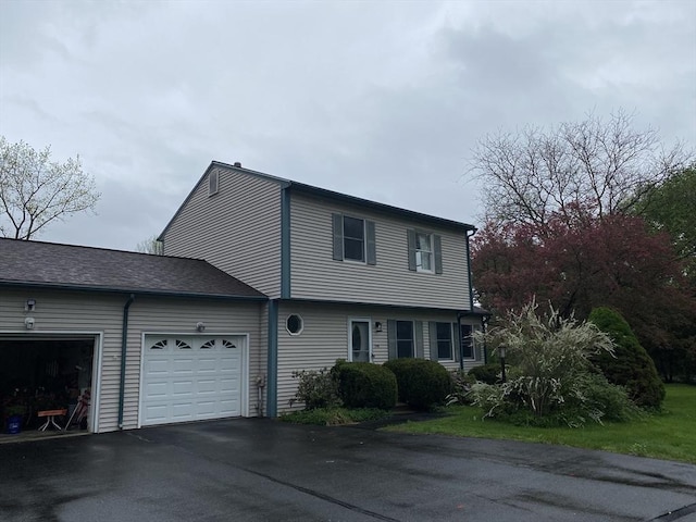14 Plain Rd E Unit B, Deerfield, MA 01373 - view of property exterior featuring an attached garage and driveway