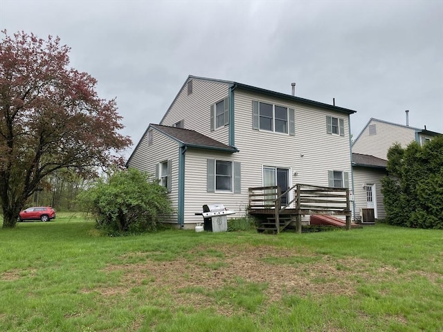 14 Plain Rd E Unit B, Deerfield, MA 01373 - back of property featuring central AC, a lawn, and a deck