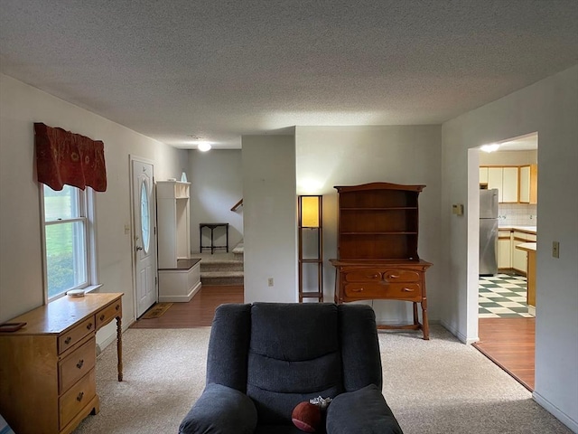 14 Plain Rd E Unit B, Deerfield, MA 01373 - living room featuring carpet, stairway, a textured ceiling, and baseboards