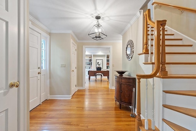 114 Hunters Ridge Rd, Concord, MA 01742 - foyer with light wood-type flooring, stairway, ornamental molding, and baseboards