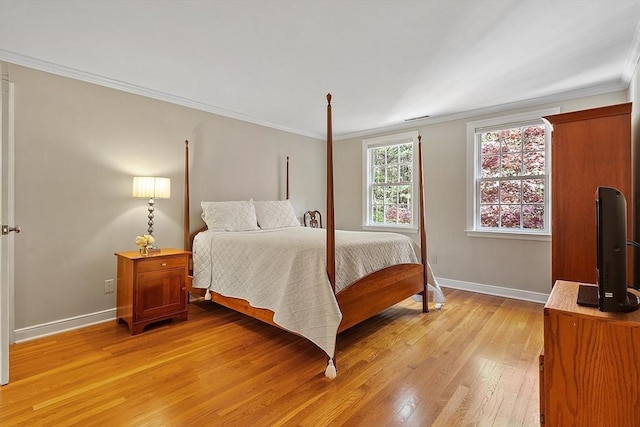 114 Hunters Ridge Rd, Concord, MA 01742 - bedroom with light wood finished floors, ornamental molding, and baseboards